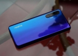  Galaxy M21: Realme         6000 